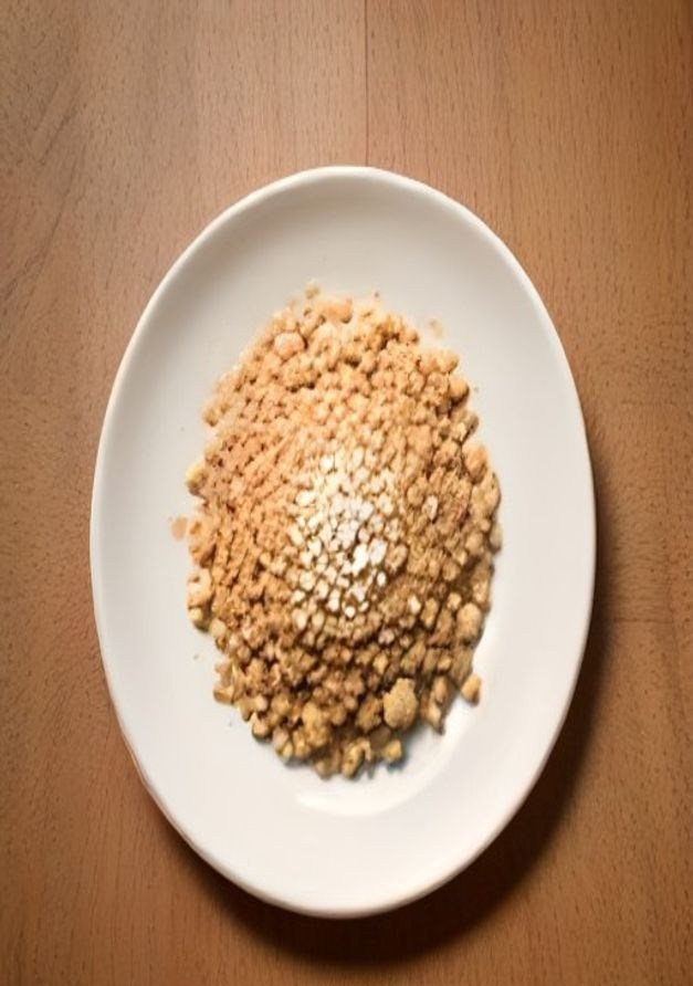 Wide shallow whisker-friendly cat dish with kibble